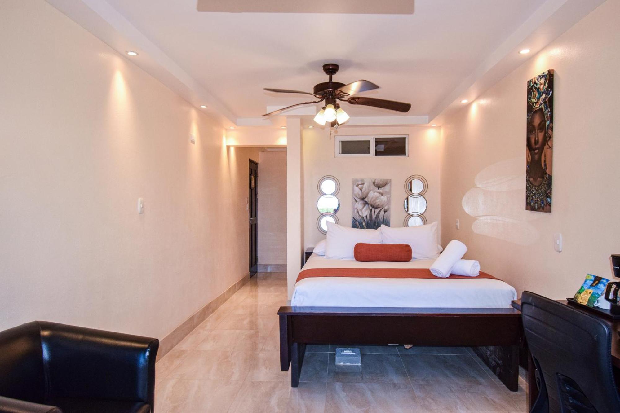Quarto com Cama Queen-size e Vista do Mar