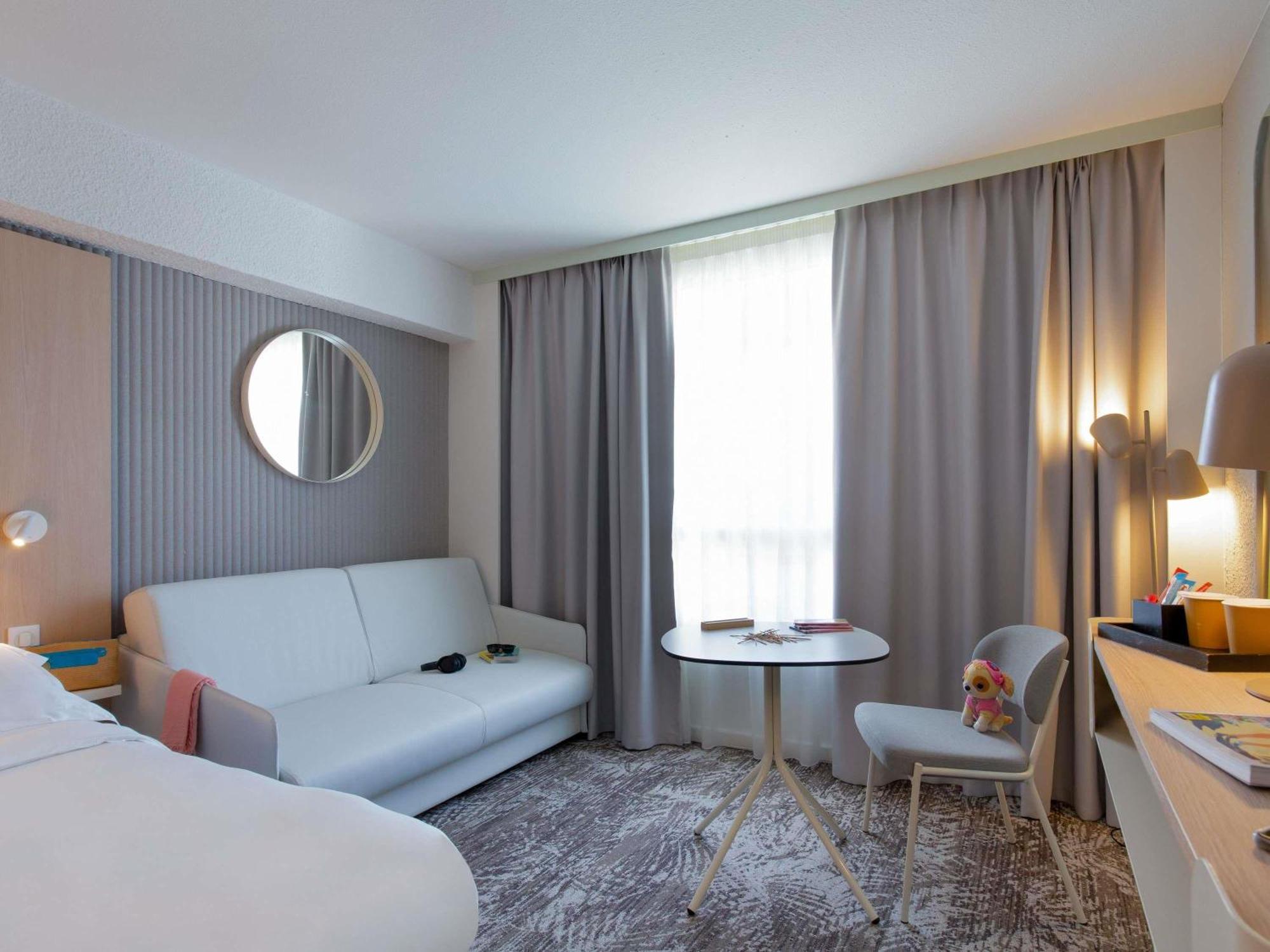 Family Room with One Double Bed and One Sofa (2 persons)