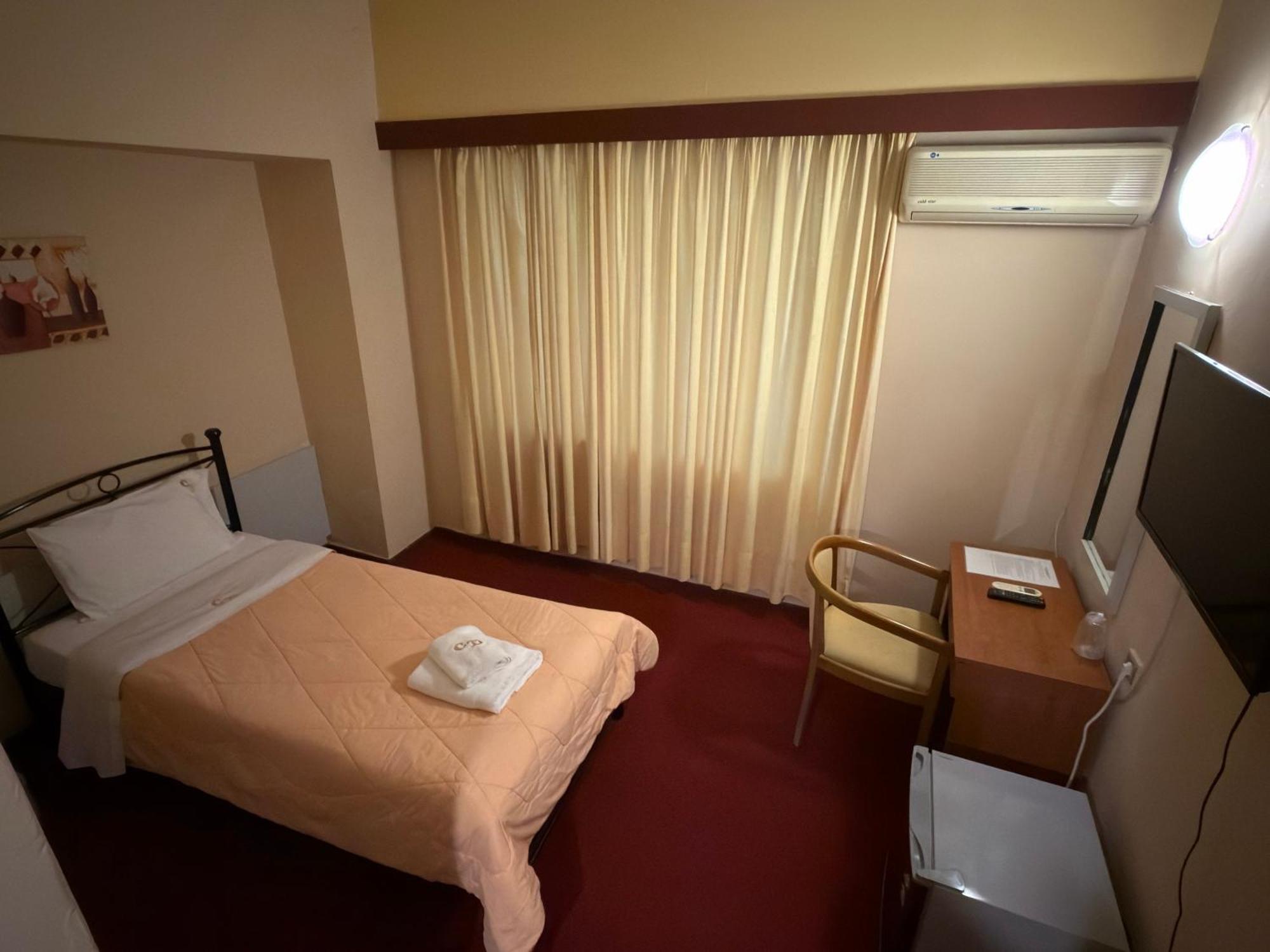 Quarto Individual Econômico