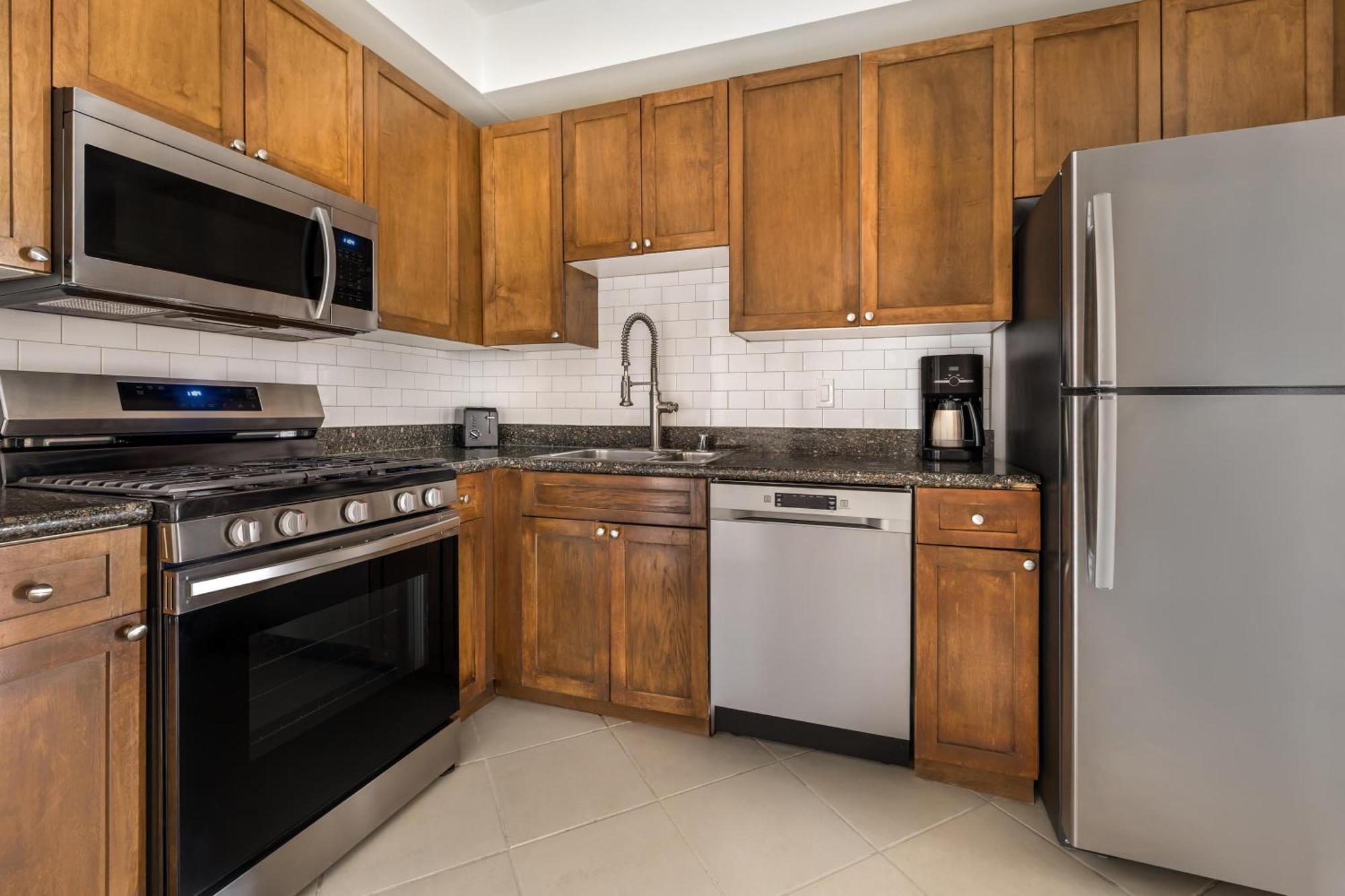 2 BEDROOM 2 KINGS POOL VIEW DELUXE SUITE