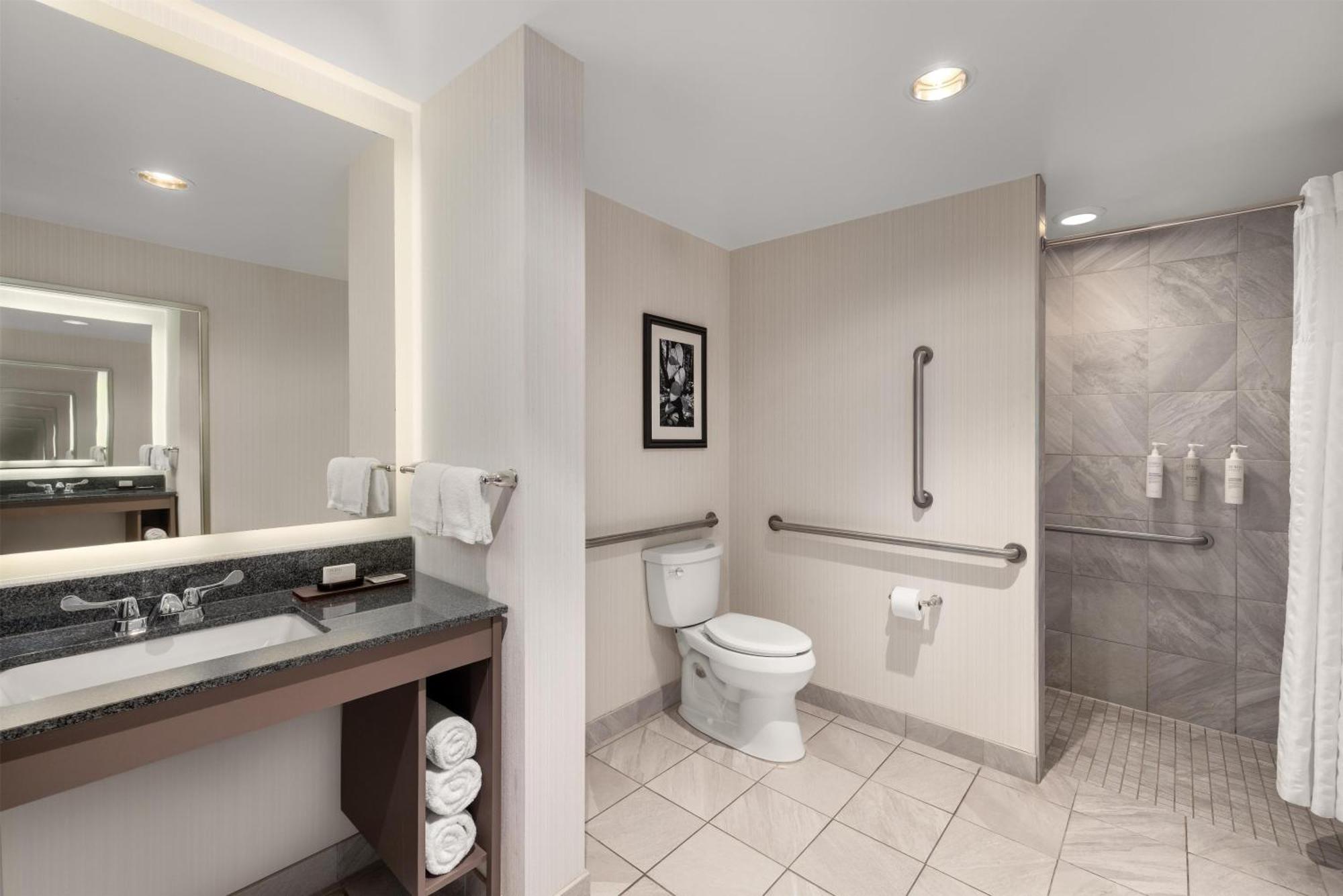Two Room Queen Suite Roll Shower Mobility Access