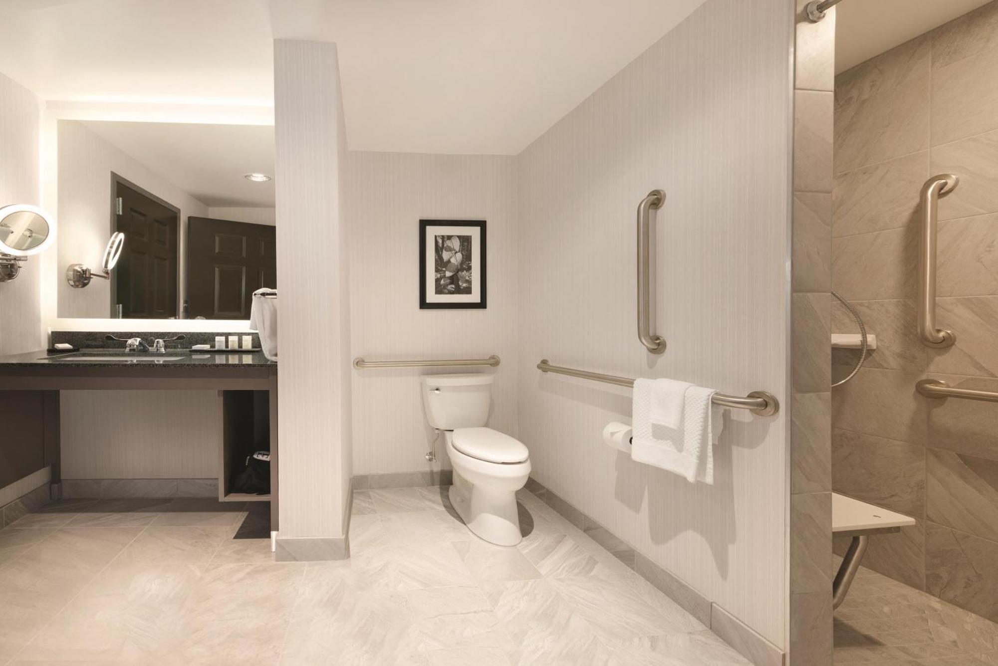 Two Room Queen Suite Roll Shower Mobility Access