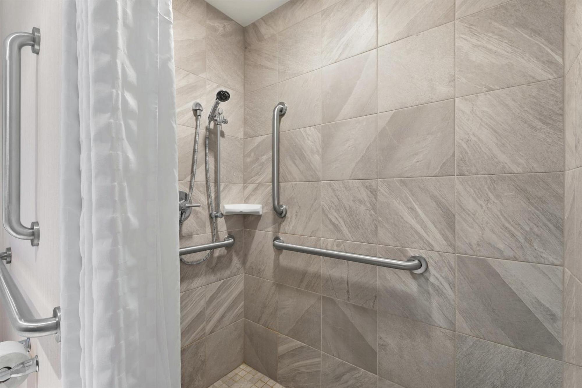 Two Room Queen Suite Roll Shower Mobility Access