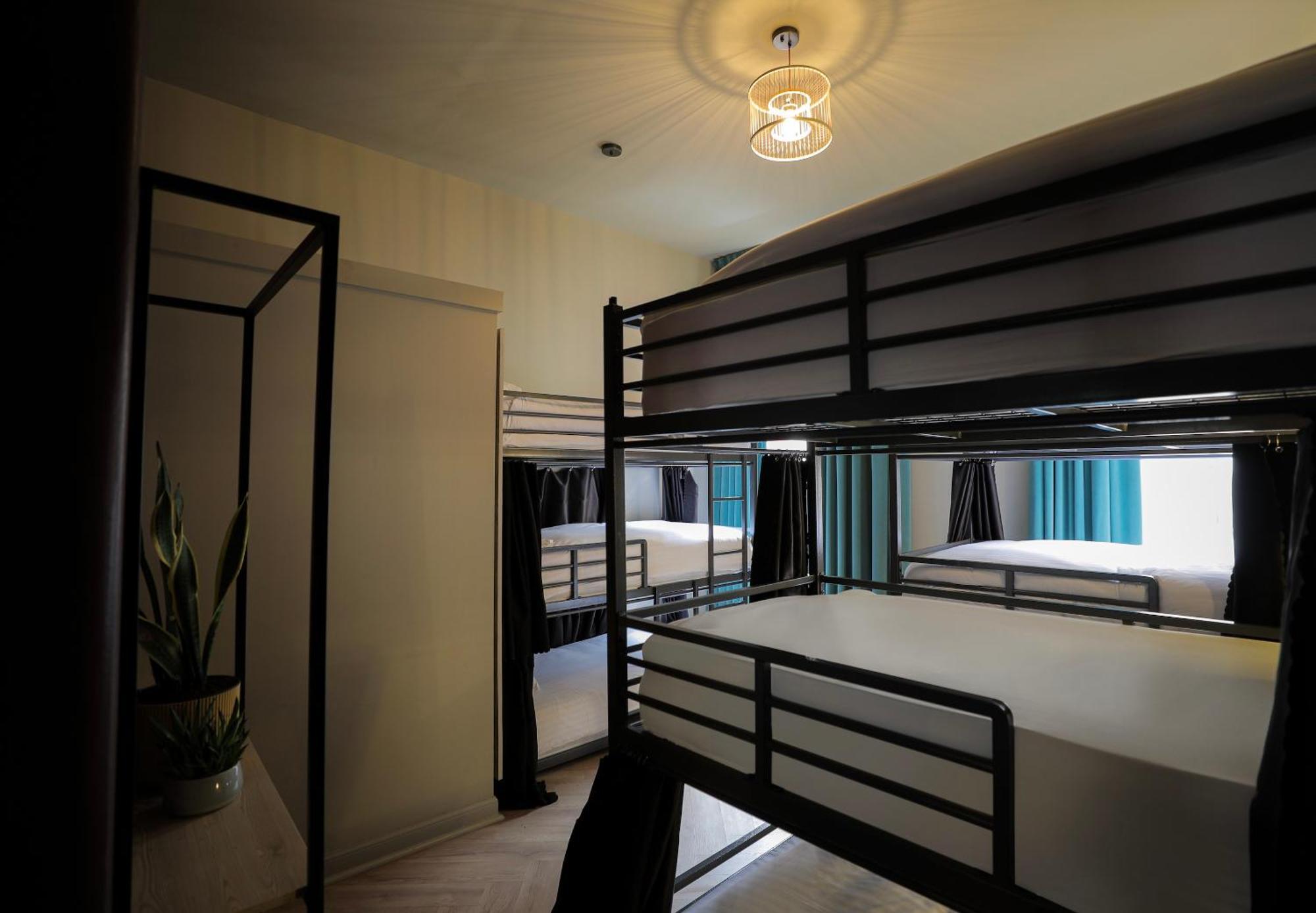 Single Bed a mixed dorm 6 triple bunk shared facilities