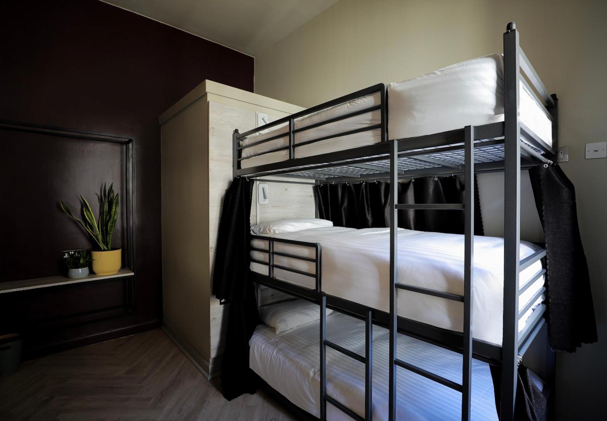 Single Bed a mixed dorm 6 triple bunk shared facilities