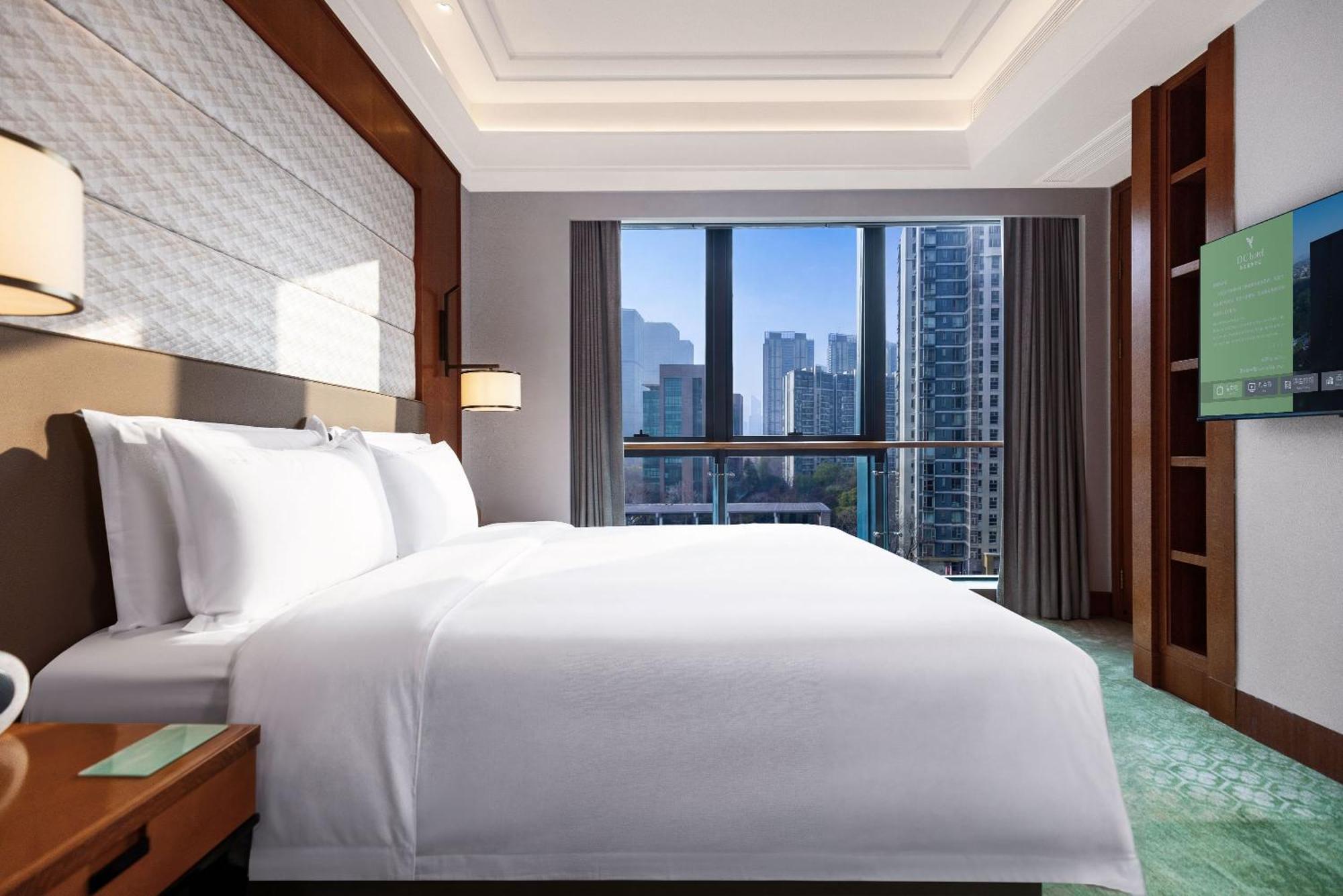 Two-Bedroom Suite with One King Bed, One Queen Bed and Kitchen