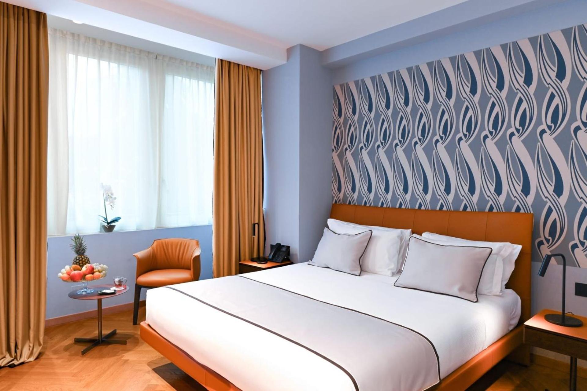 Deluxe Doppel-/Zweibettzimmer mit teilweisem Meerblick
