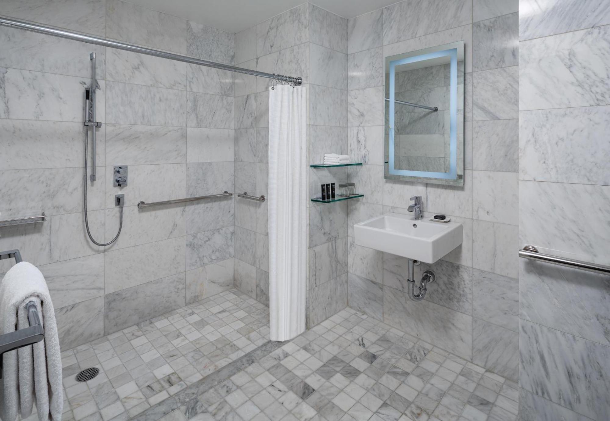 Queen Room Roll Shower Accessible