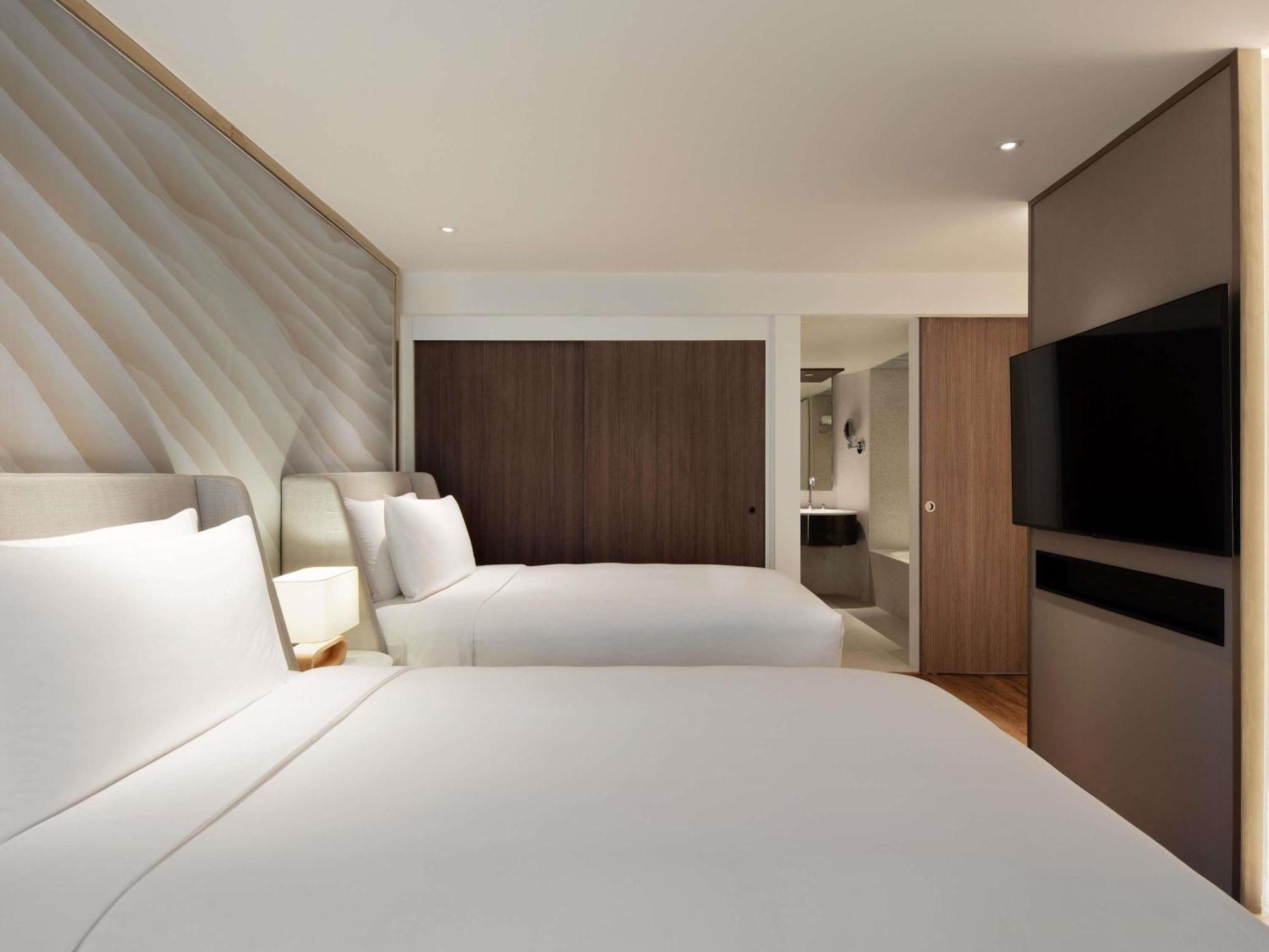 One-Bedroom Family Suite Twin Beds Sofa Bed