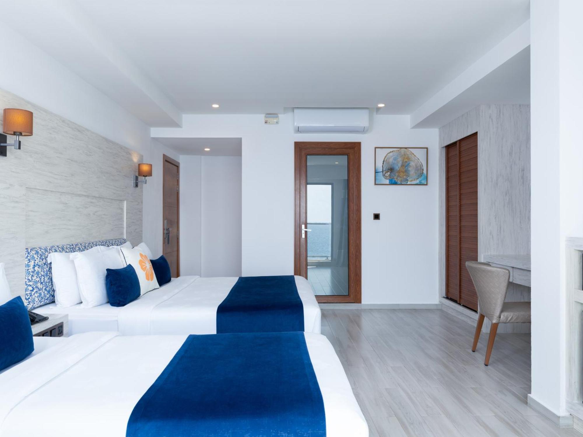 Quarto Família Deluxe com Vista do Mar e Varanda