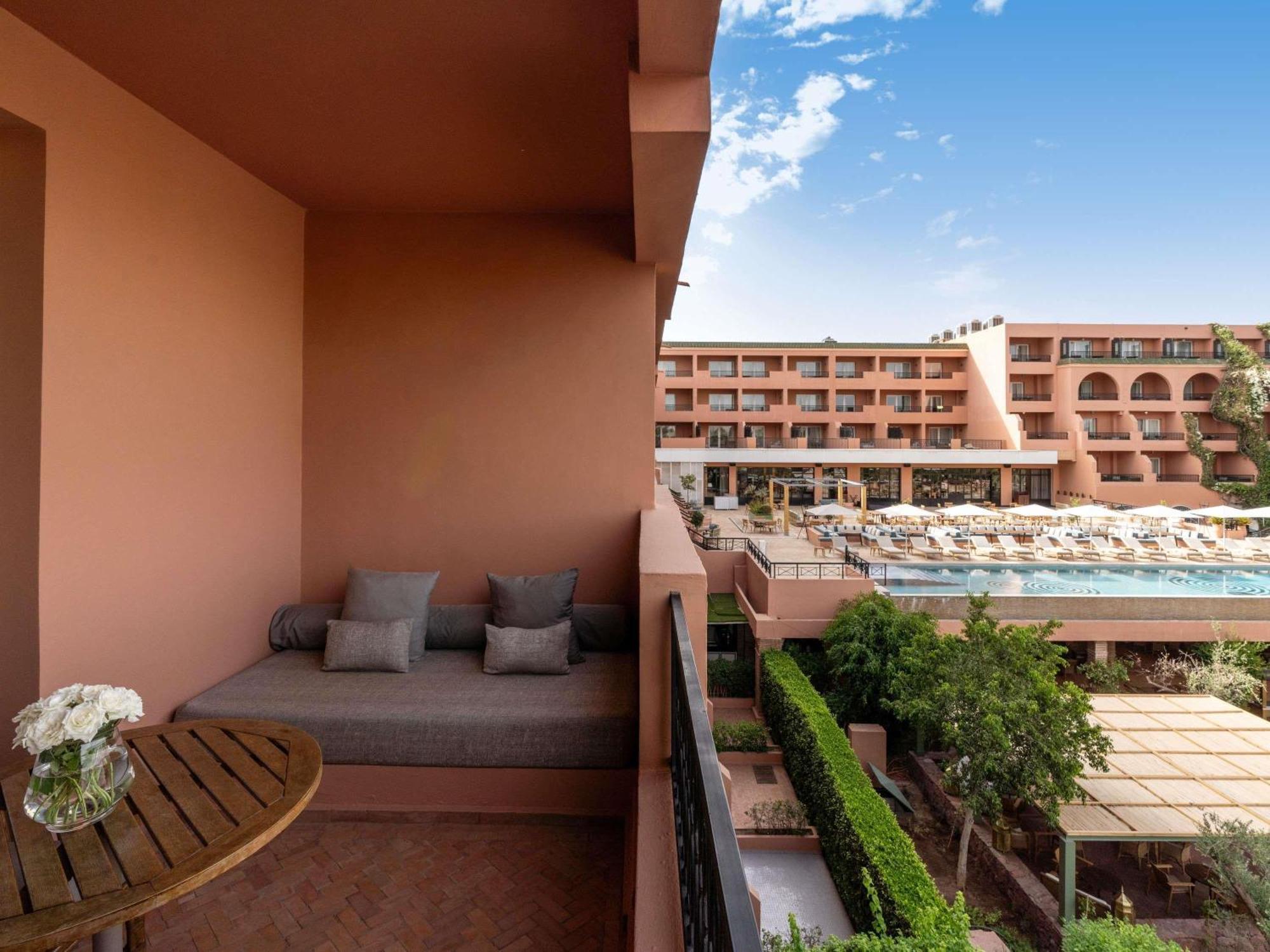 Contemporary Deluxe Room Balcony Pool View