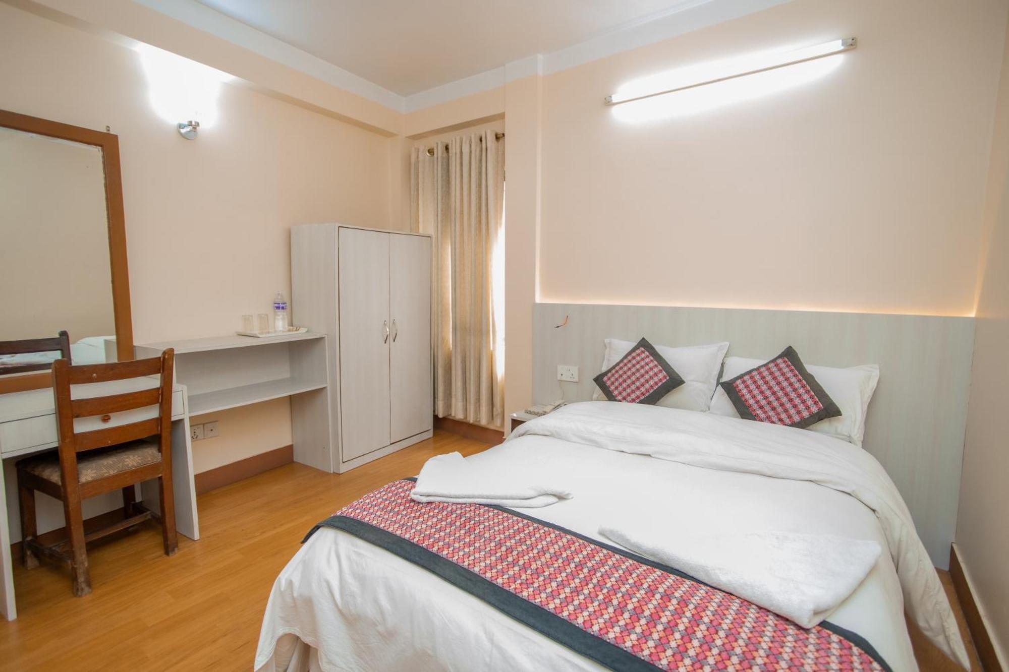 Quarto Deluxe com Cama de Casal ou 2 de Solteiro