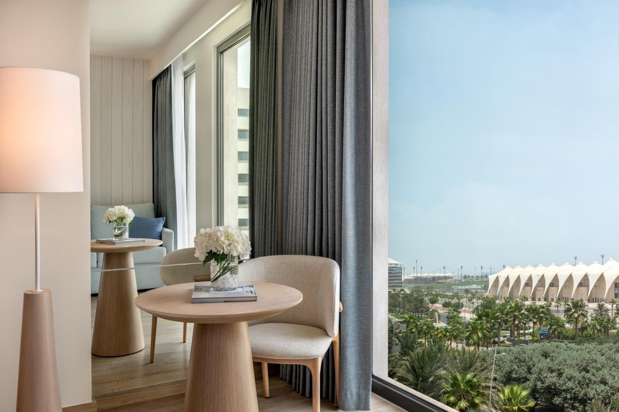 One-Bedroom Suite Plaza View Living Area Theme Park Access