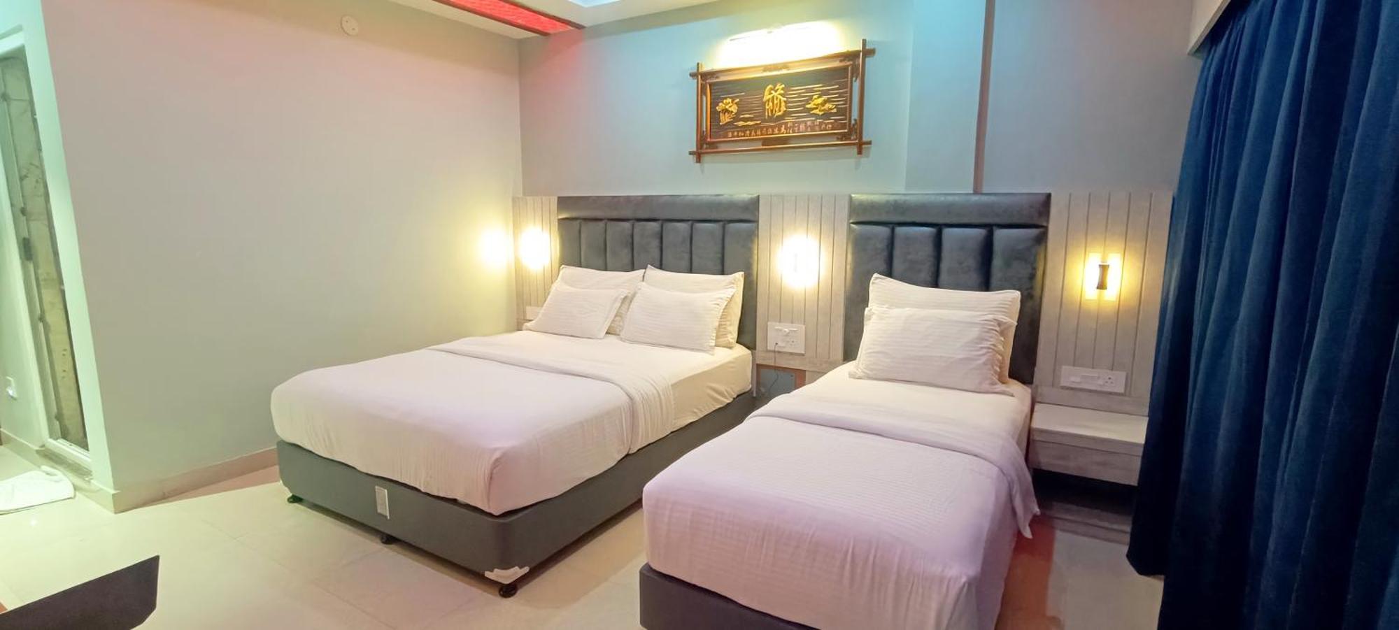 Deluxe Triple Room