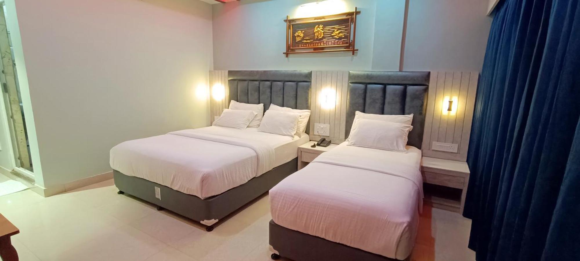 Deluxe Triple Room