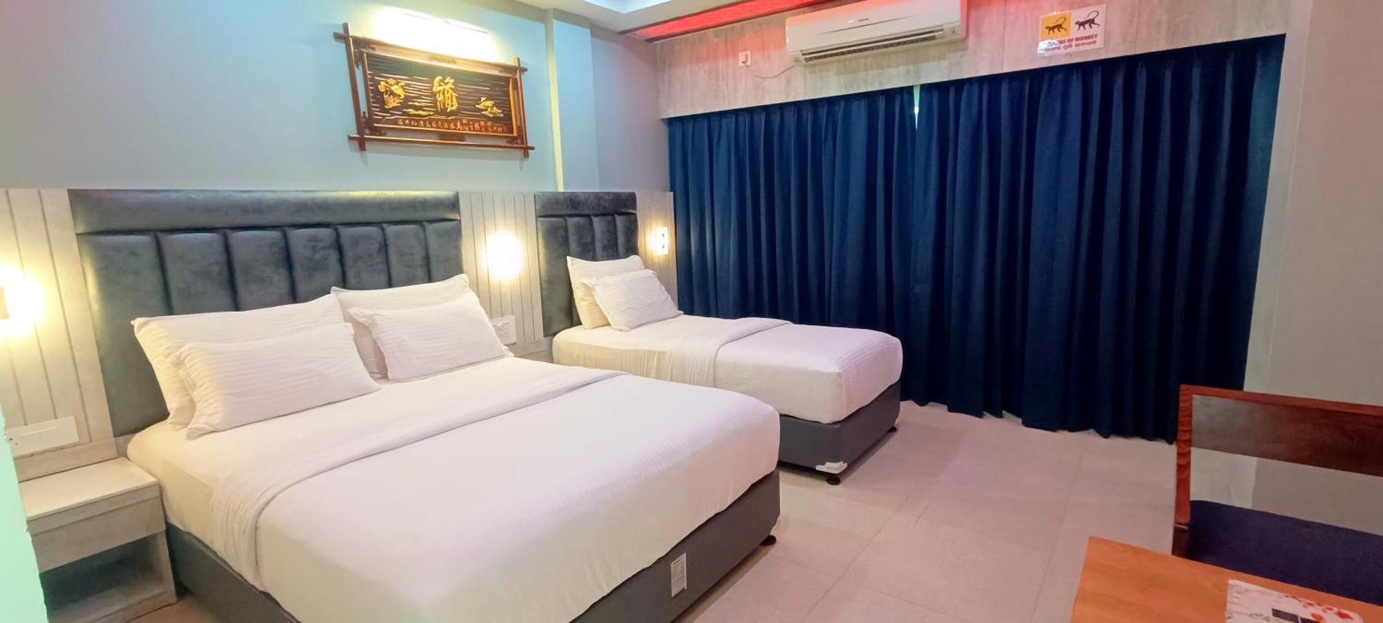 Deluxe Triple Room
