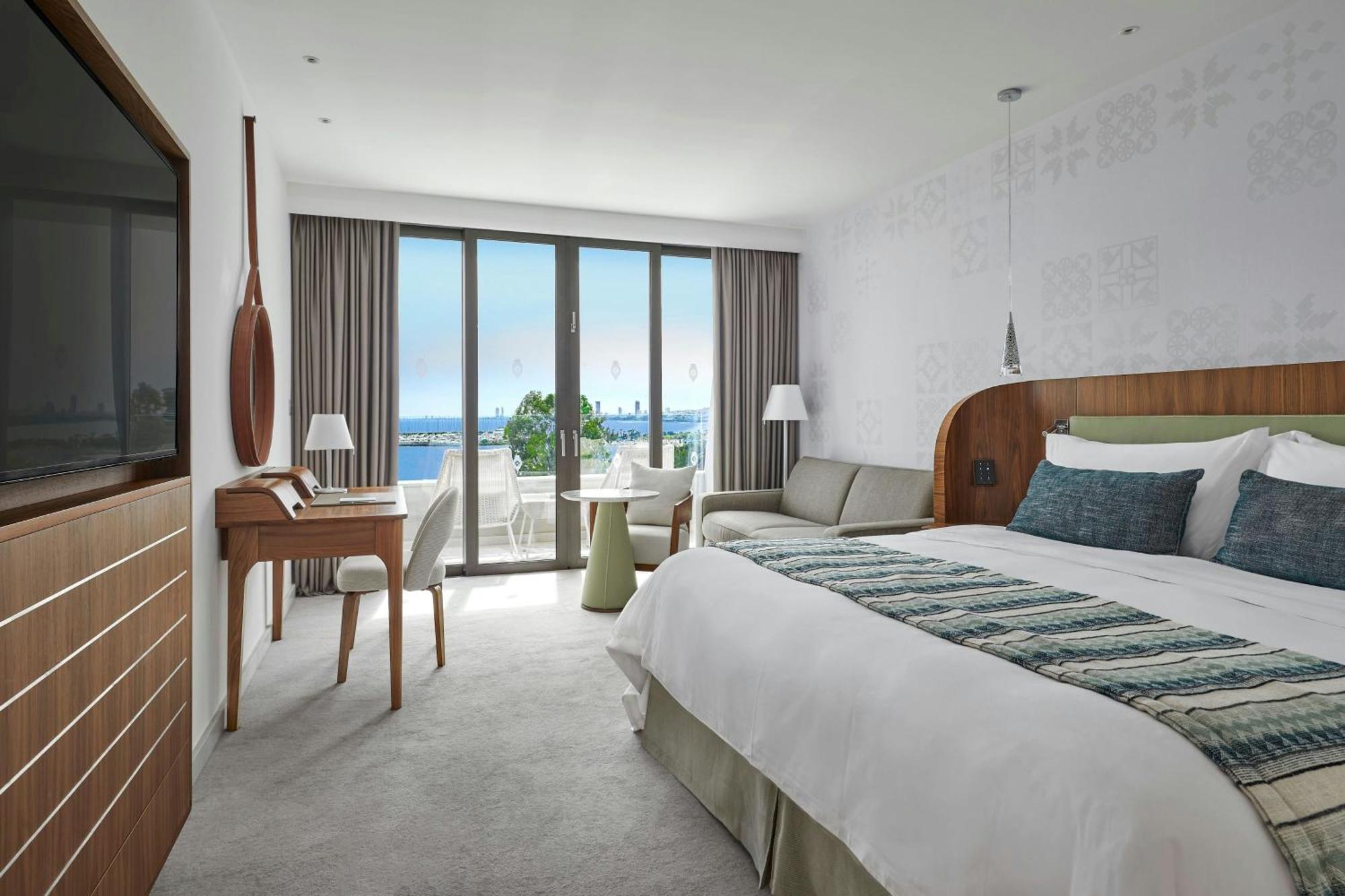 Deluxe Sea View Larger Guest room 1 King Sofa bed,1774434393:JPEG