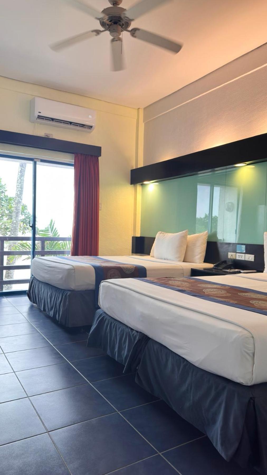 Queen Suite with Two Queen Beds and Beach View - Non-Smoking