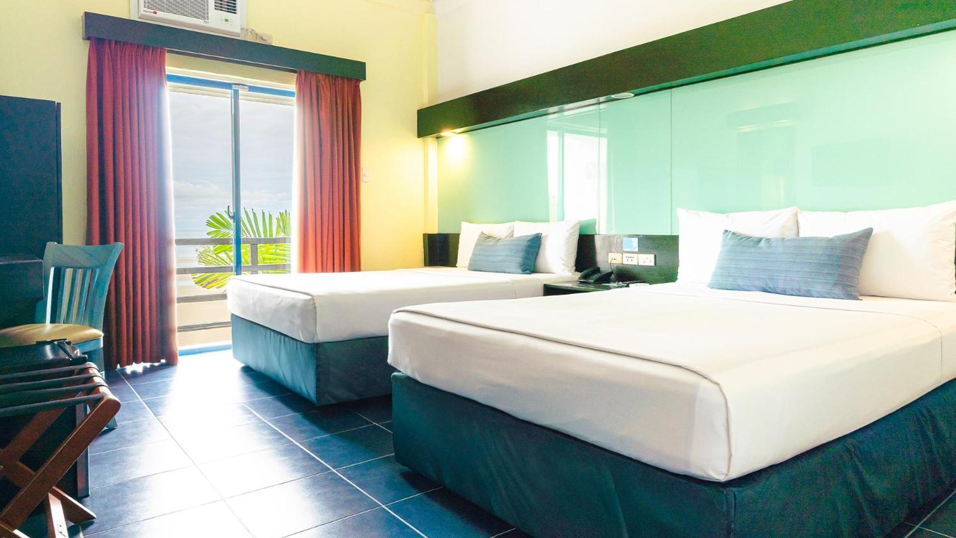 Premium Queen Room with Two Queen Beds and Beach View - Non-Smoking