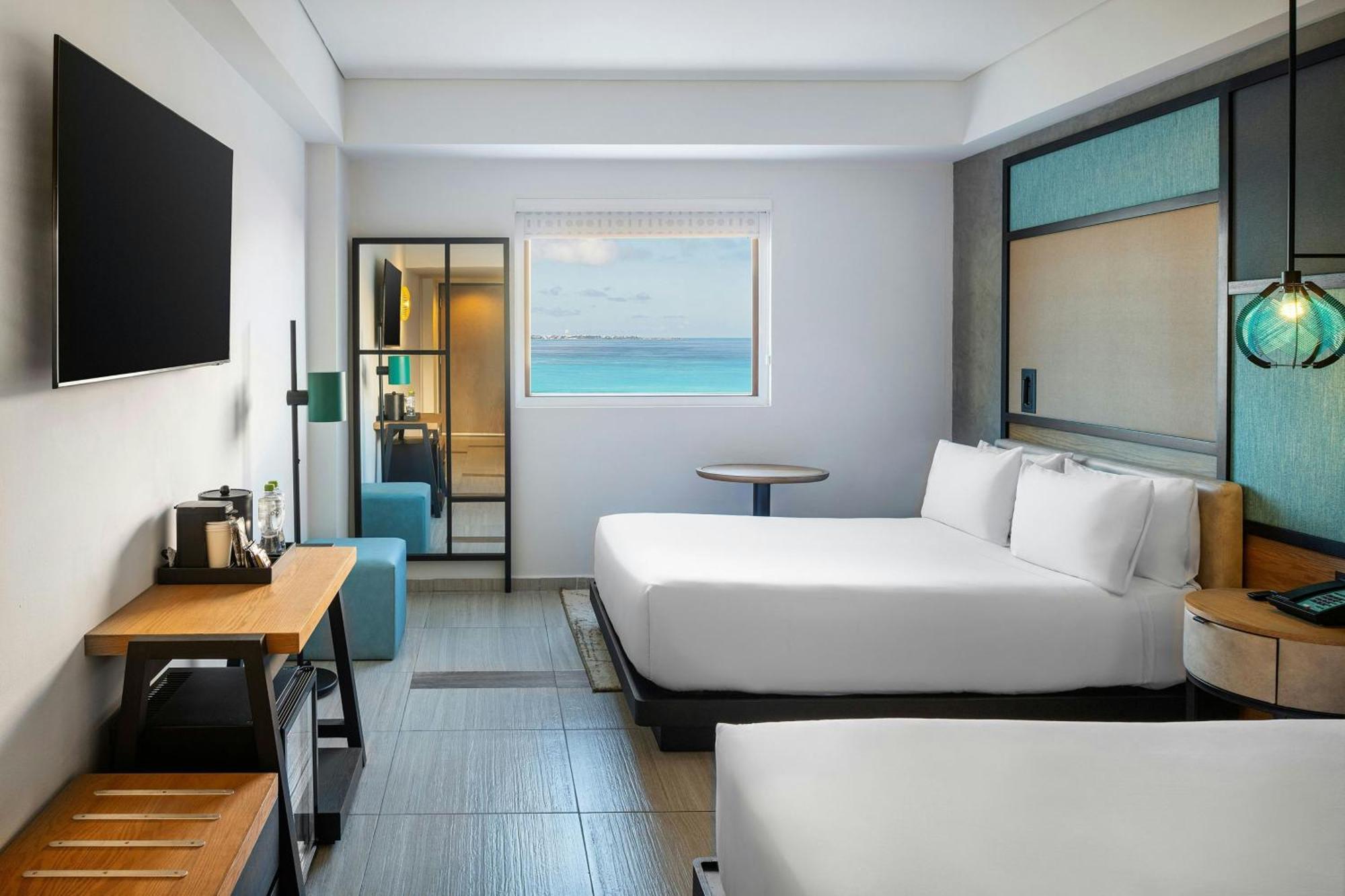 Aloft Partial View Guest room 2 Queen Complimentary open bar