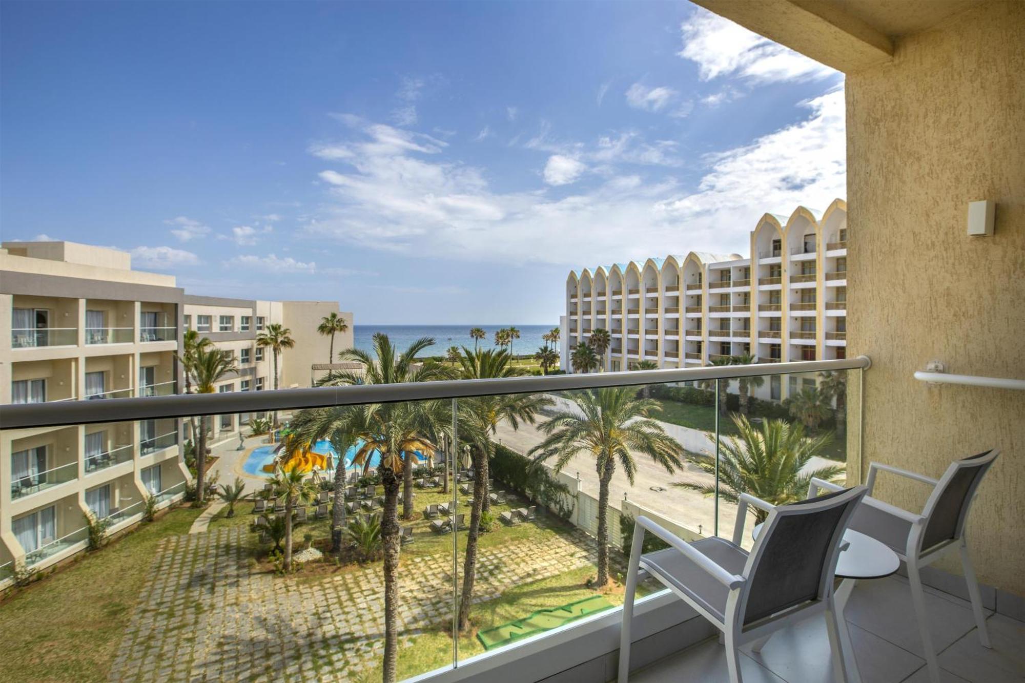Deluxe Double Room Two Double Beds Partial Sea View