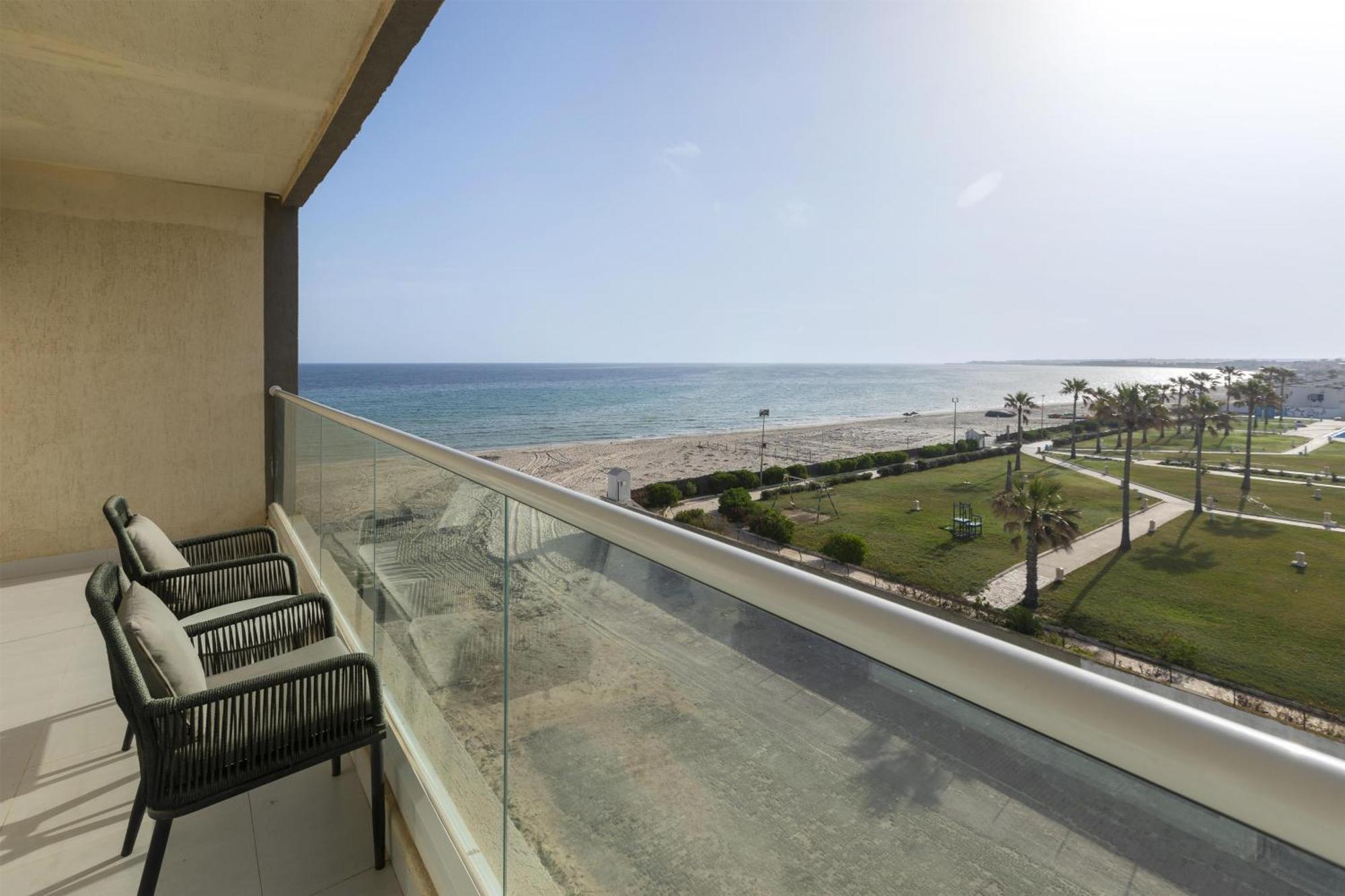 Deluxe Double Room Two Double Beds Partial Sea View