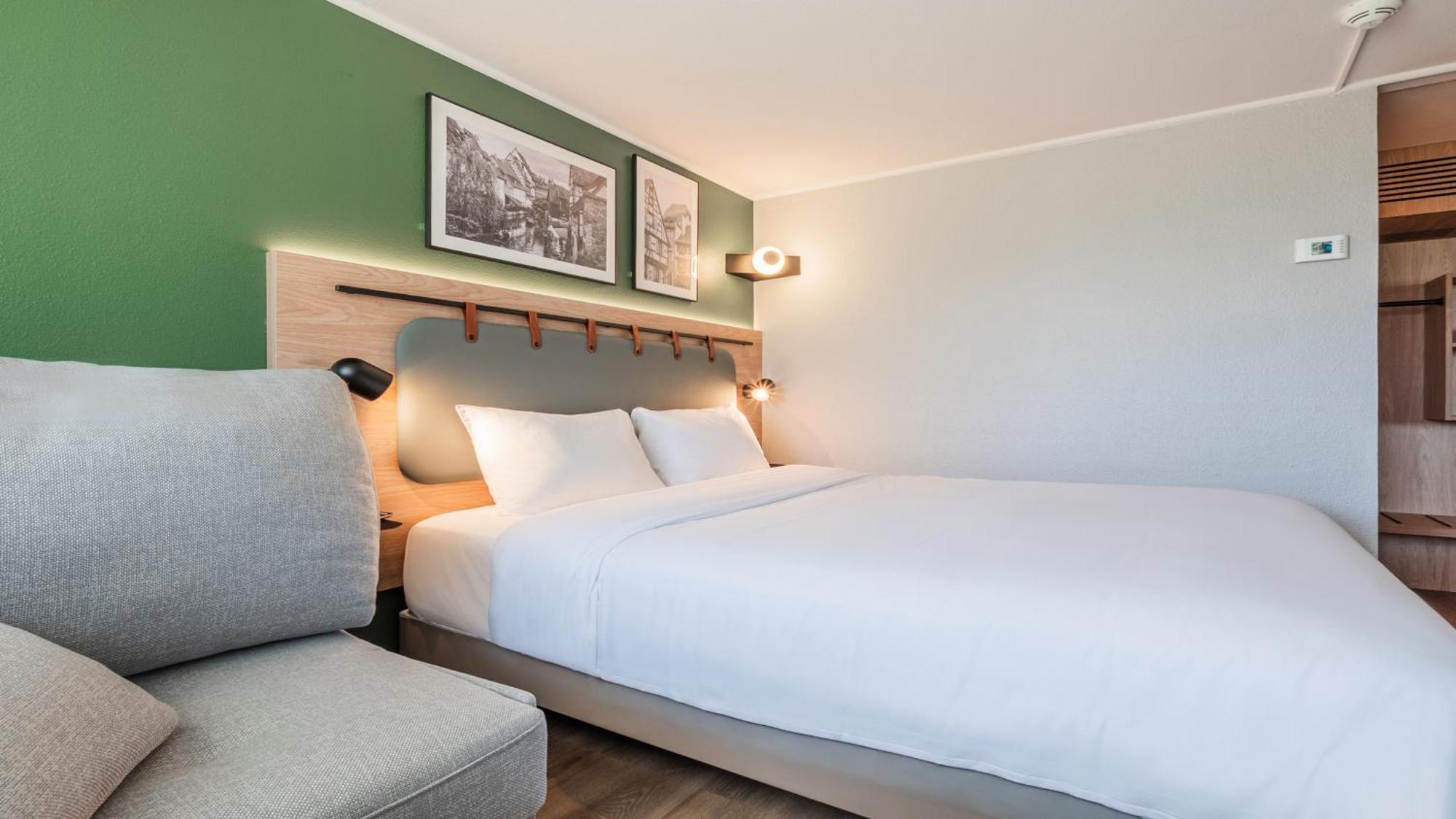 Standard Room One Queen Bed One Sofa Bed