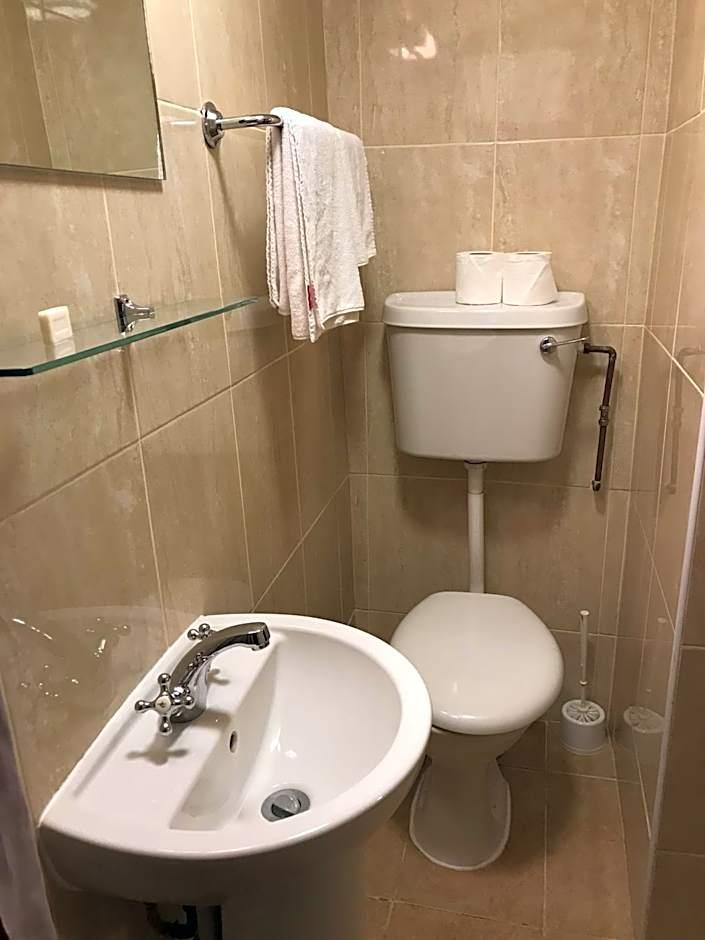 Quarto Individual com Banheiro Privativo