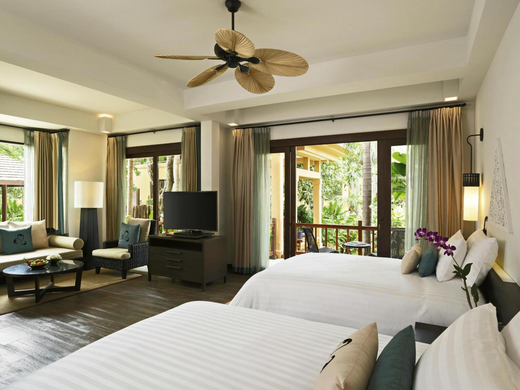 Junior Suite mit 2 Einzelbetten und Poolblick