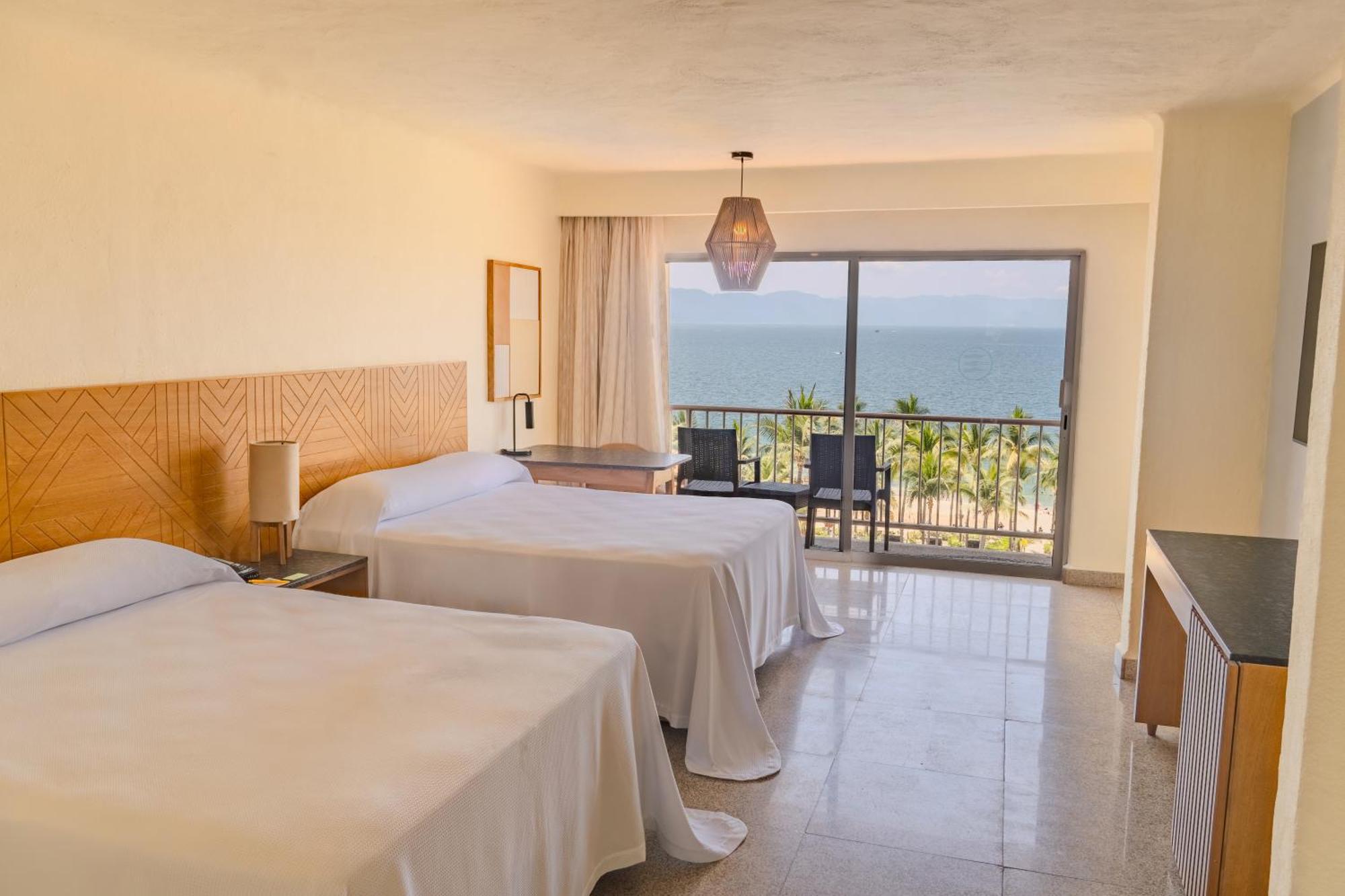 Habitación Doble Deluxe con vistas laterales al mar