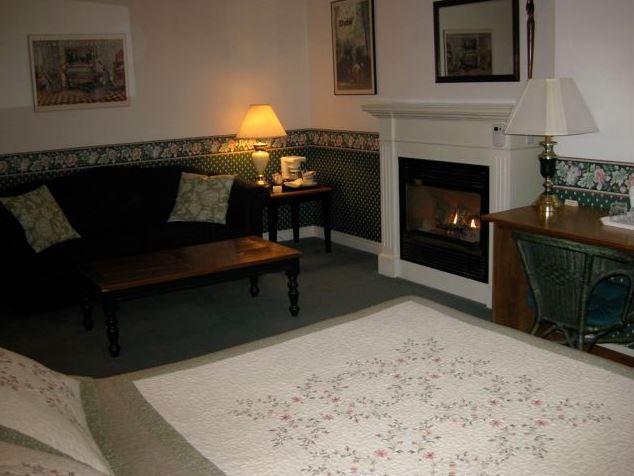 Habitación Superior con cama grande y chimenea