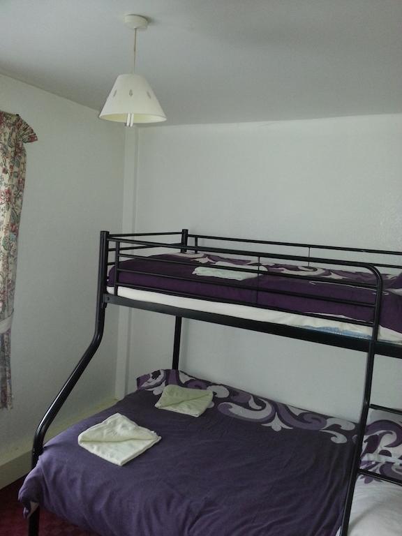 Camera Familiare con Bagno in Comune