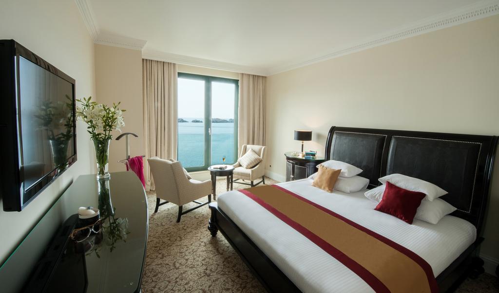 Suite Deluxe con vistas al mar y balcón - Cama extragrande