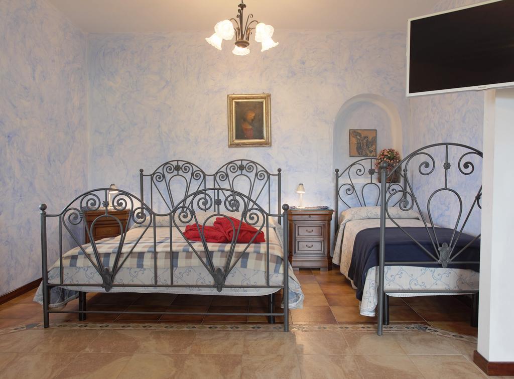 Chambre Triple avec Terrasse