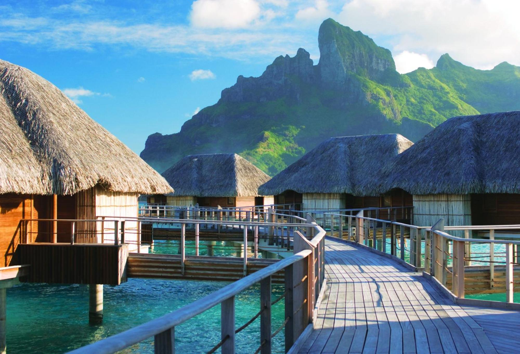 Suite de 1 dormitorio en un bungalow sobre el agua con vistas a la playa y cama extragrande