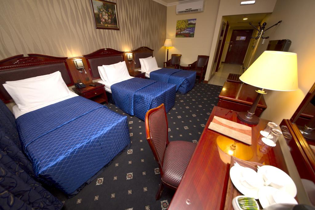 Deluxe Triple Room