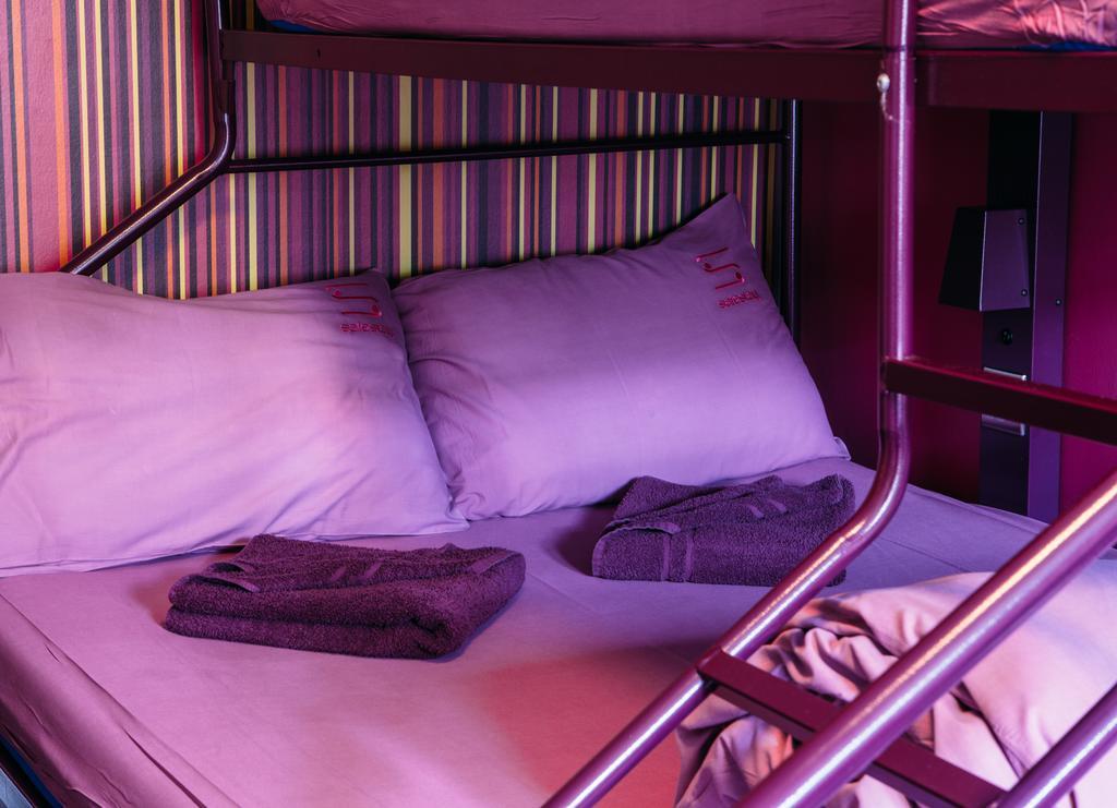 Quarto Triplo com Banheiro Compartilhado