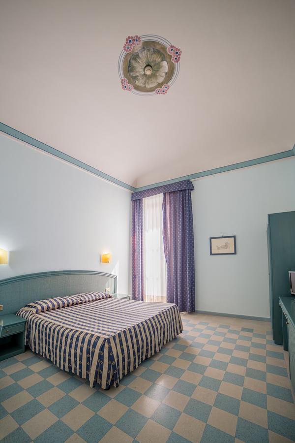 Quarto Standard com Cama de Casal ou 2 de Solteiro