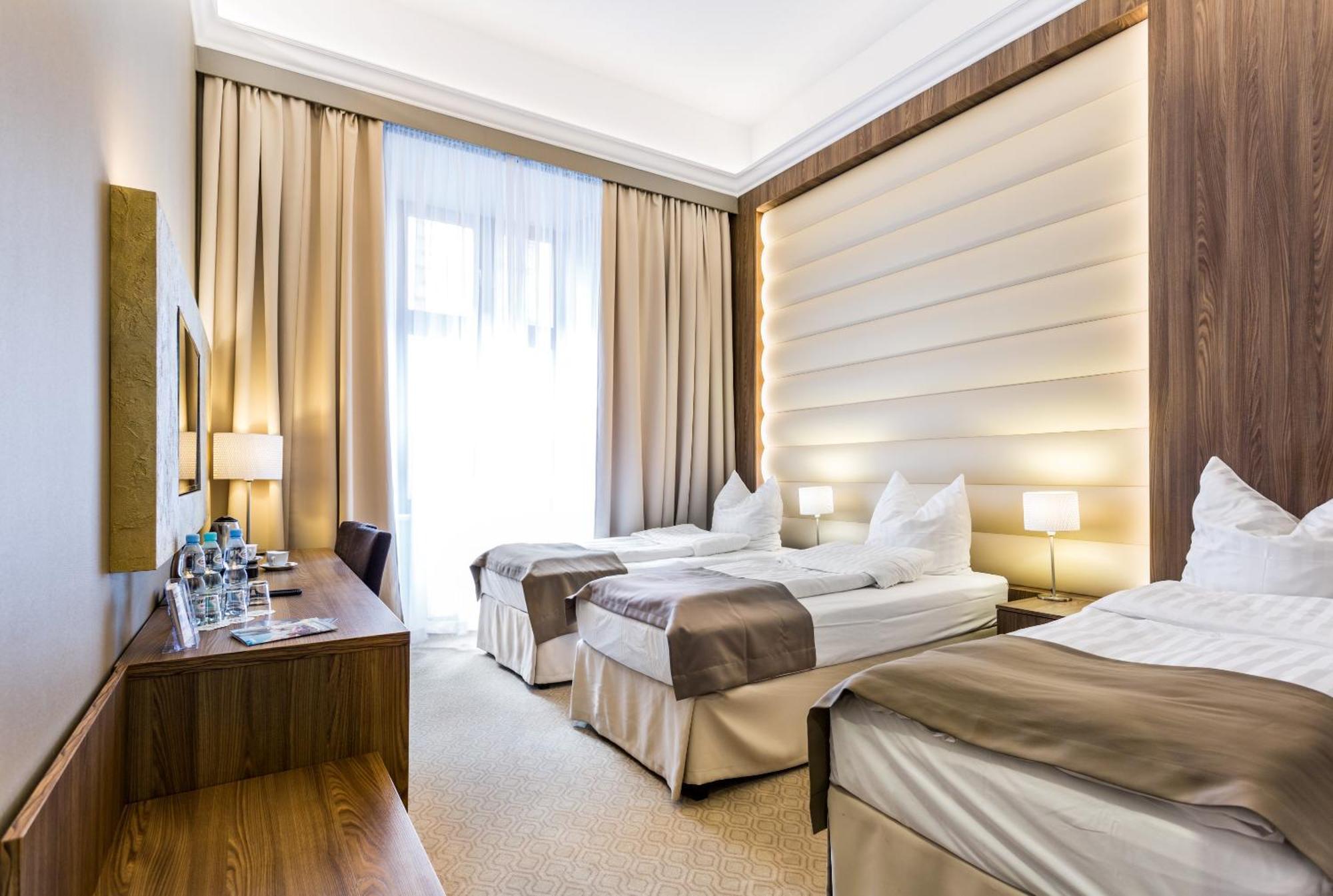 Deluxe Dreibettzimmer