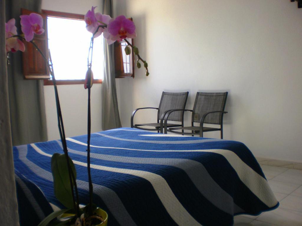 Zimmer mit Queensize-Bett und Meerblick