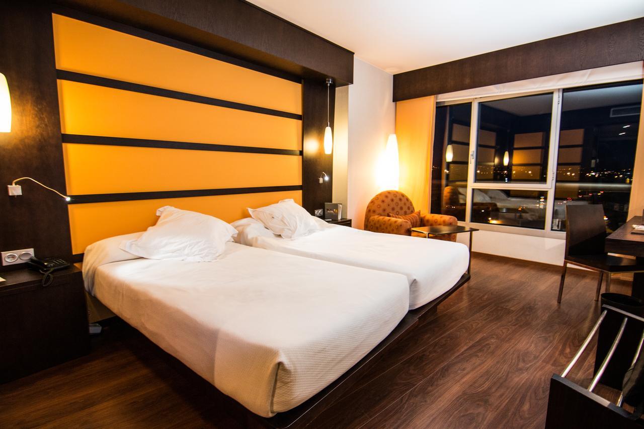 Quarto Twin com Cama Extra (3 Adultos)