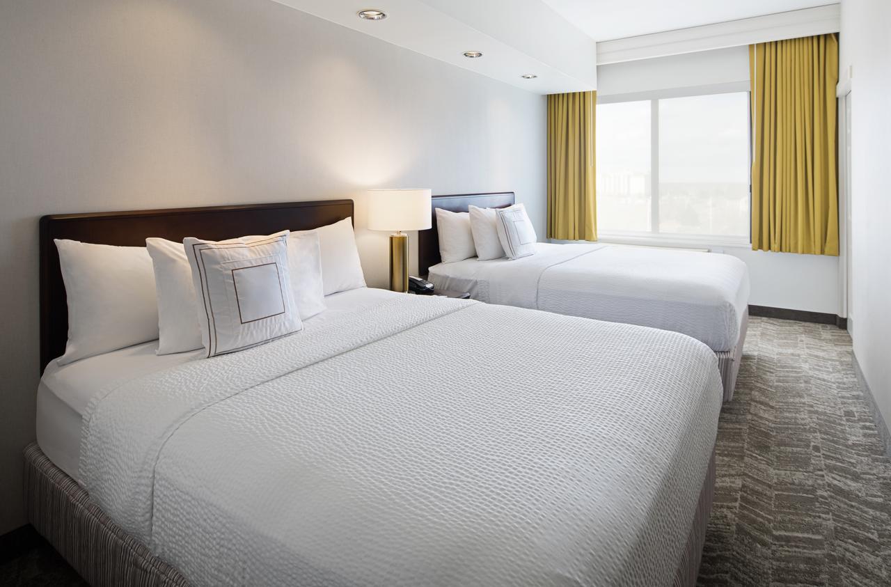 Queen Suite Two Queen Beds Bathtub Trundle Sofa Mobility Access or Hearing Accessible