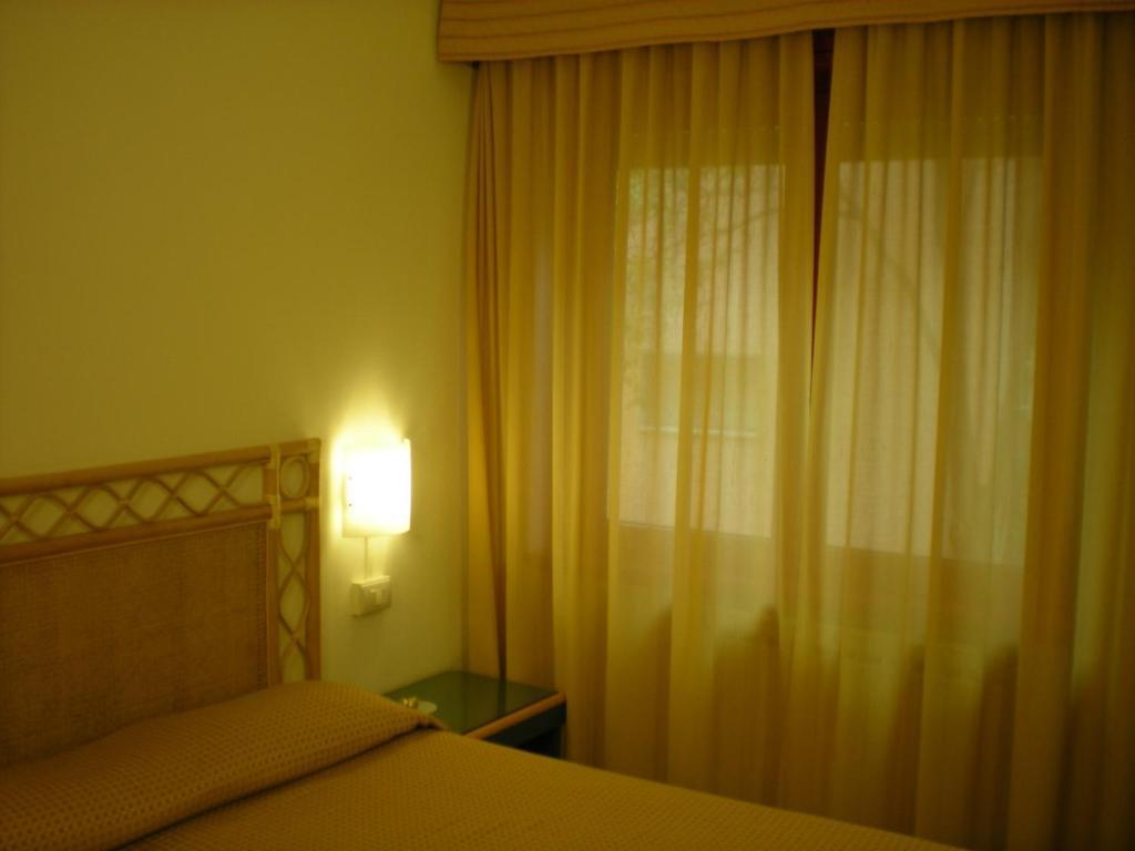 Chambre Double avec Lit d'Appoint (2 Adultes + 2 Enfants)