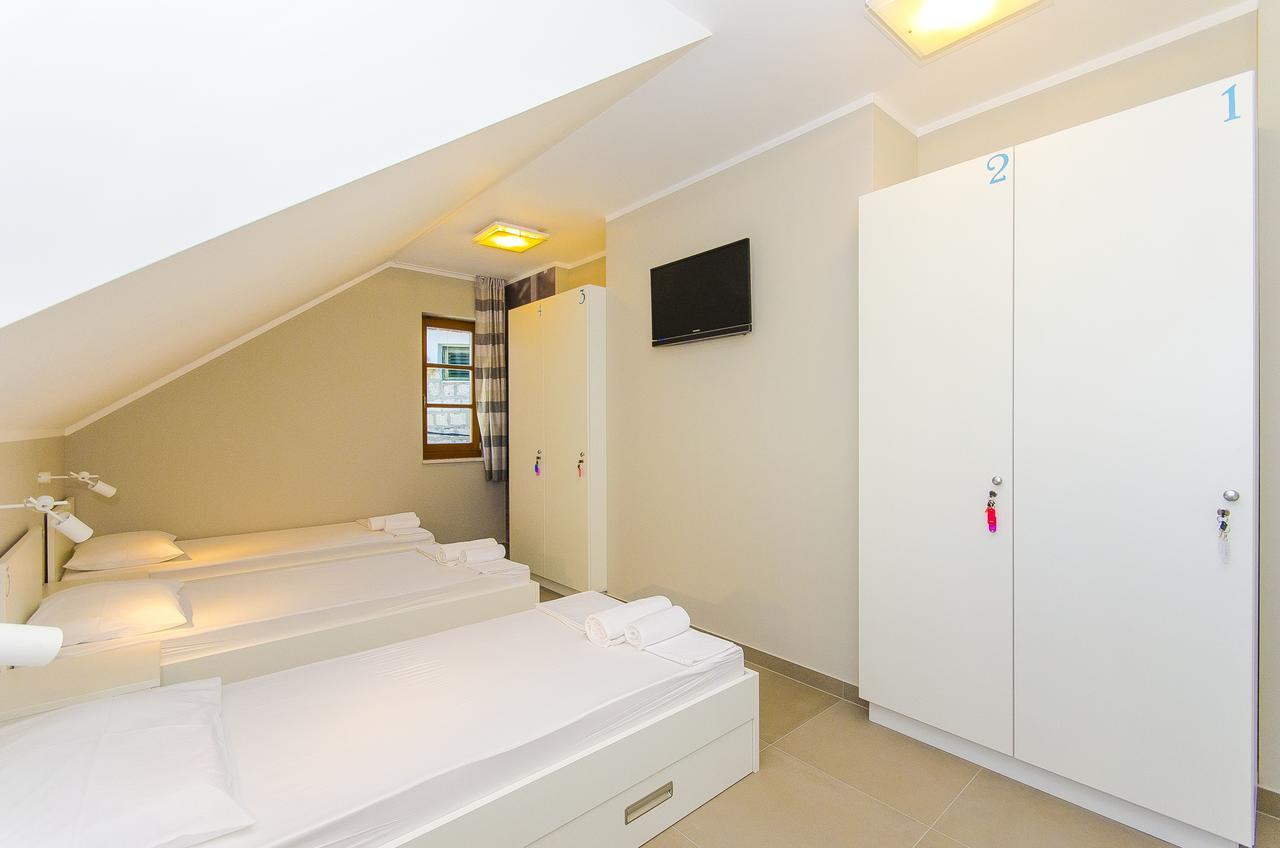 Single Bed 4-Bed Dormitory Room