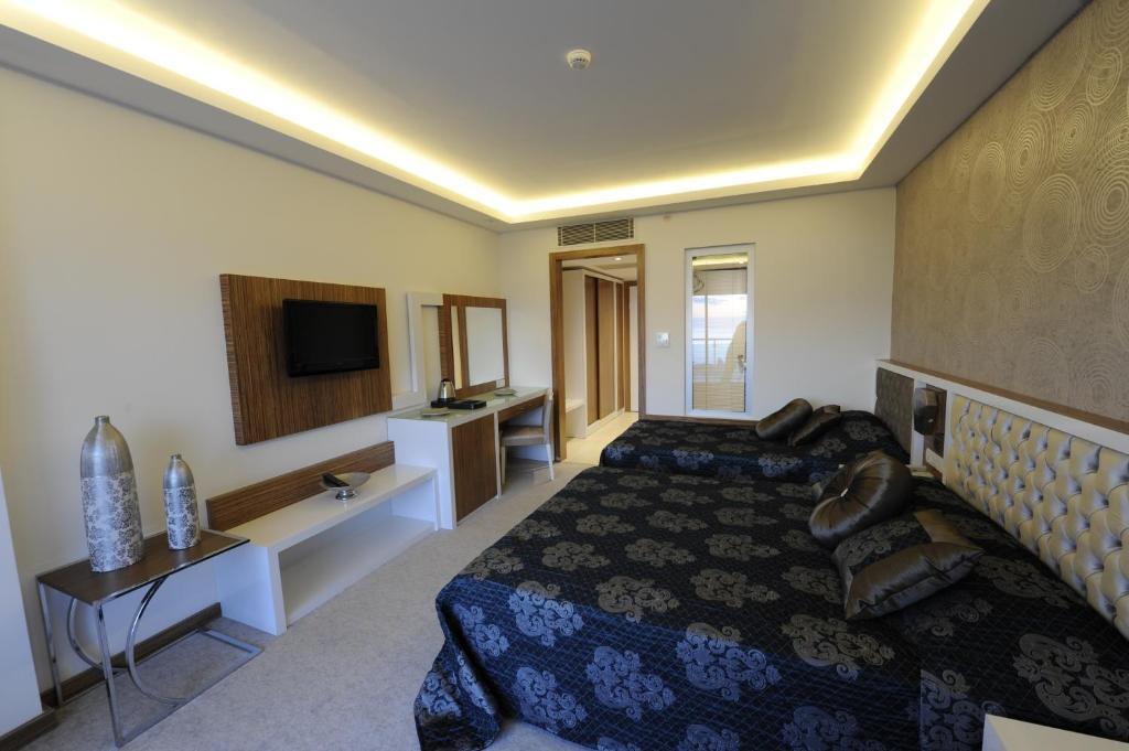 Quarto Standard com Cama de Casal ou 2 de Solteiro e Varanda