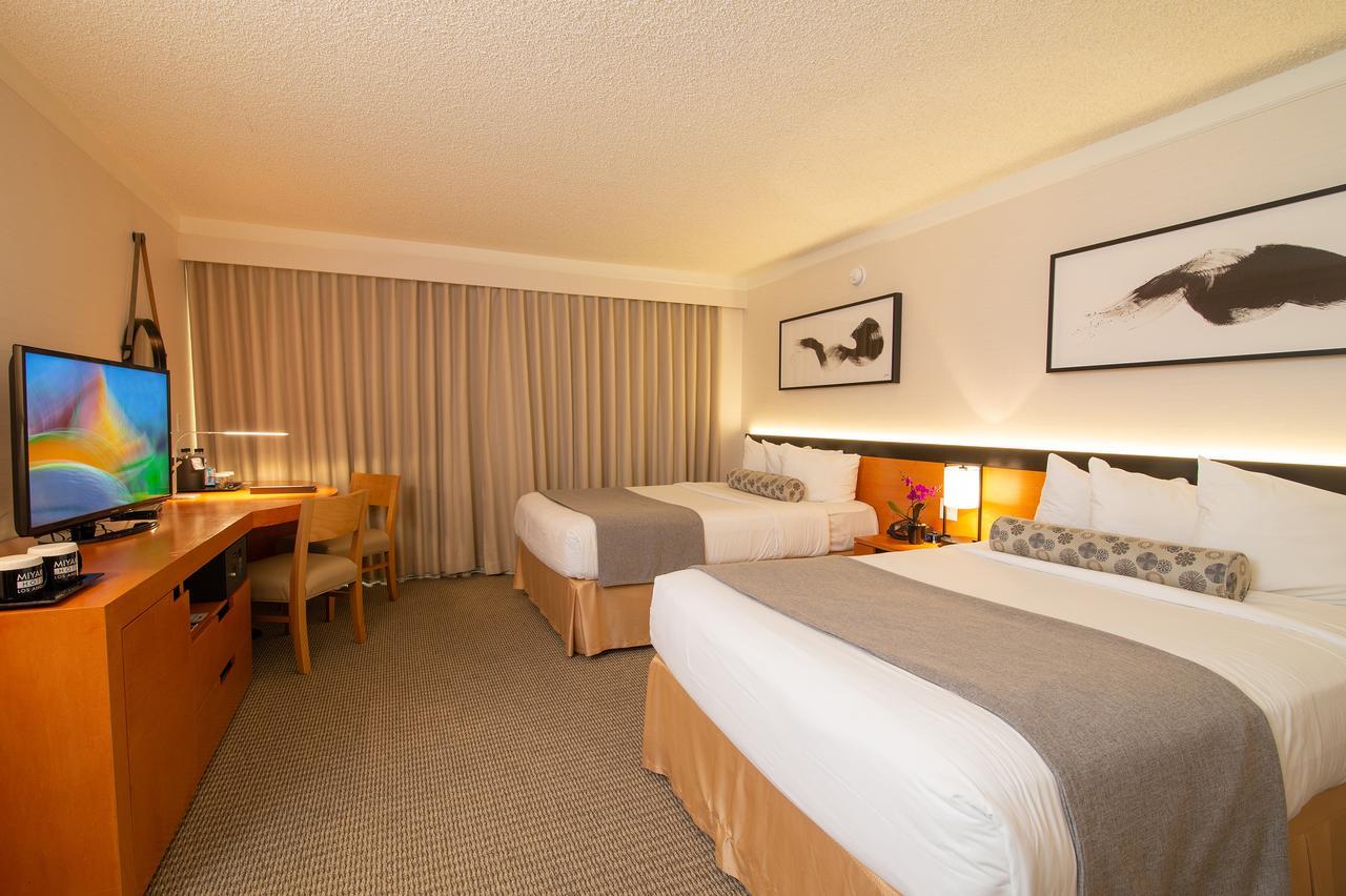 Quarto Superior com 2 Camas de Casal