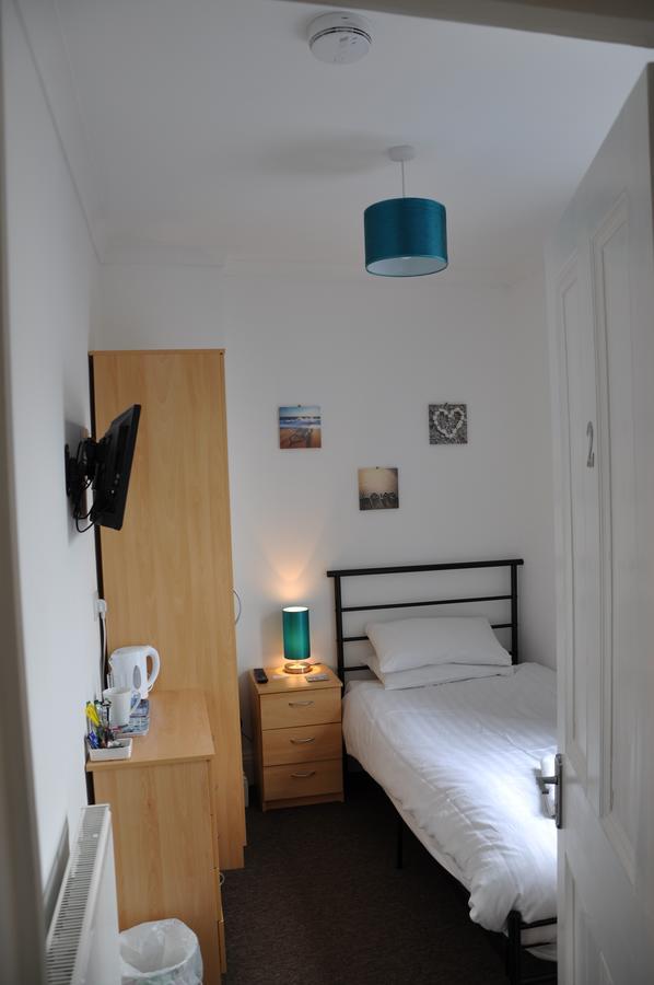 Single Room Shared Shower Toilet
