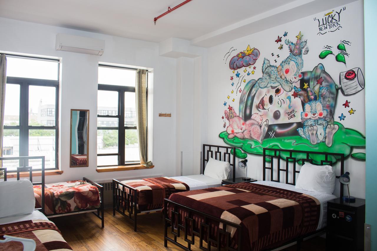 Eenpersoonsbed in een Gemengde Slaapzaal met 4 Bedden en een Eigen Badkamer