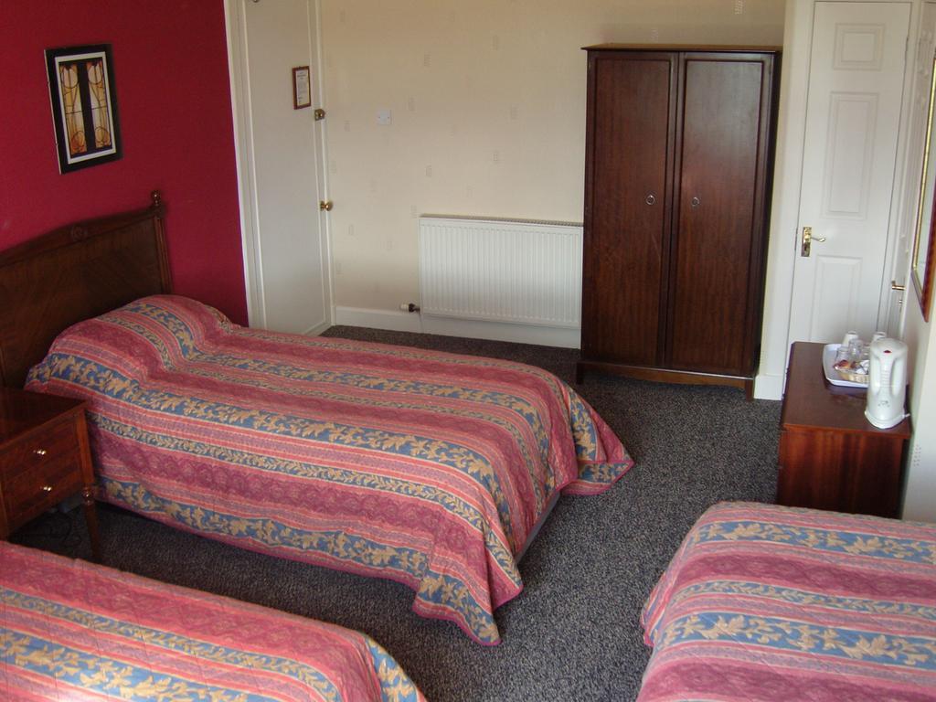 Quarto Família (4 Adultos)