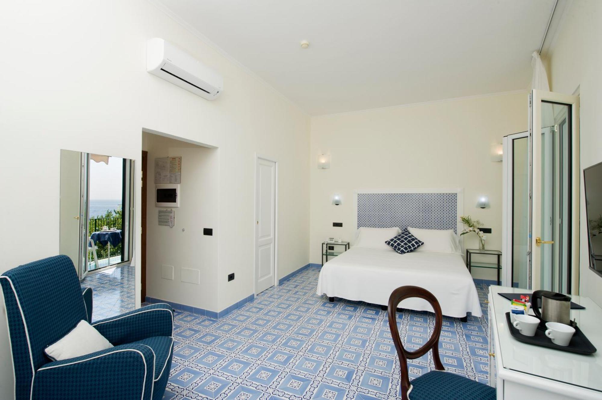 Double or Twin Room with Partial Sea View,463282455:JPEG